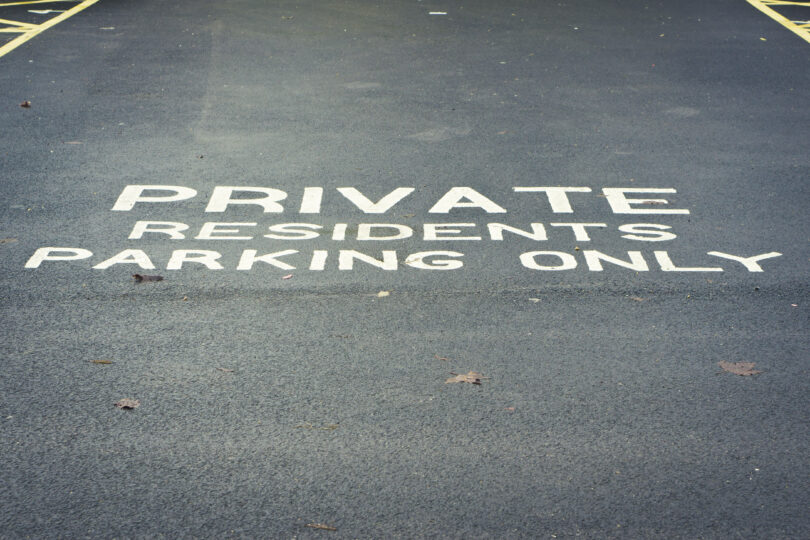 A Painted Sign For A Residents Only Parking Area